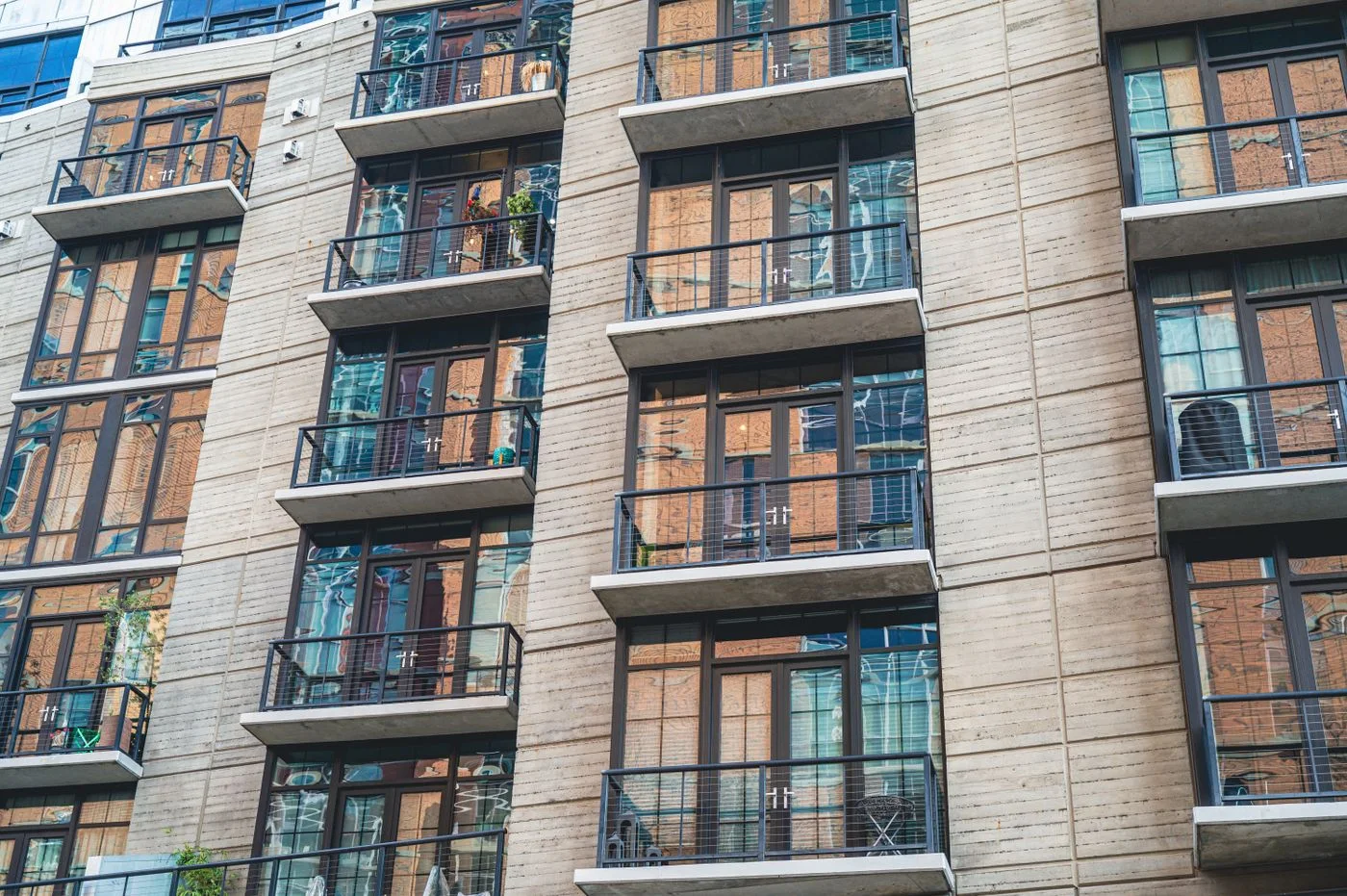 Apartment building balconies; representative stock photograph