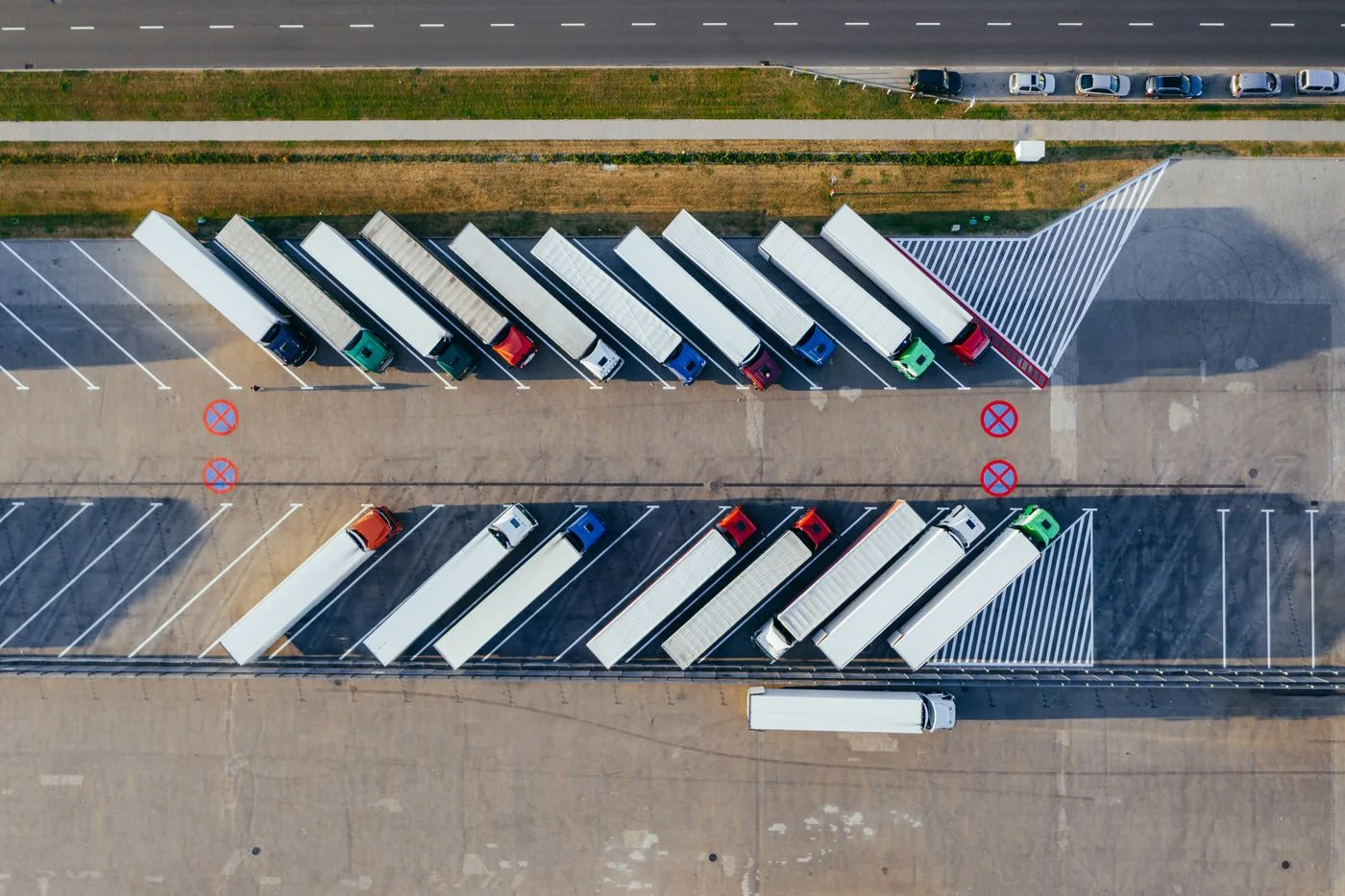 Freight trailers in a logistics yard; representative stock photograph